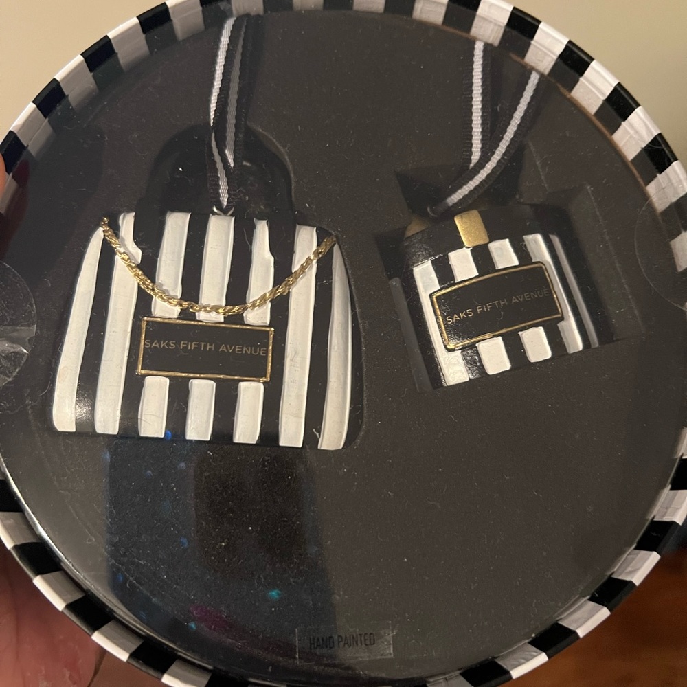 Brand new sealed Saks Fifth Avenue ornament set. Perfect for the holidays!